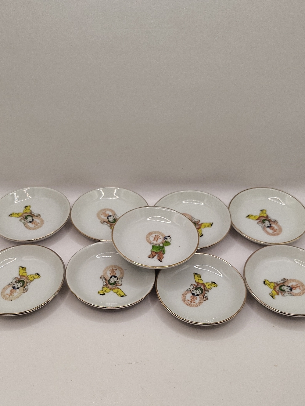 Set of 9 Vintage Porcelain Saucers with Chinese Character Motif